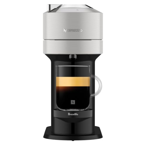 Nespresso Vertuo Next Coffee & Espresso Maker by Breville, Light Grey | Light grey coffee machine with slim, sustainable design. Brews 6 cup sizes, espresso to 18 oz., all topped with crema.